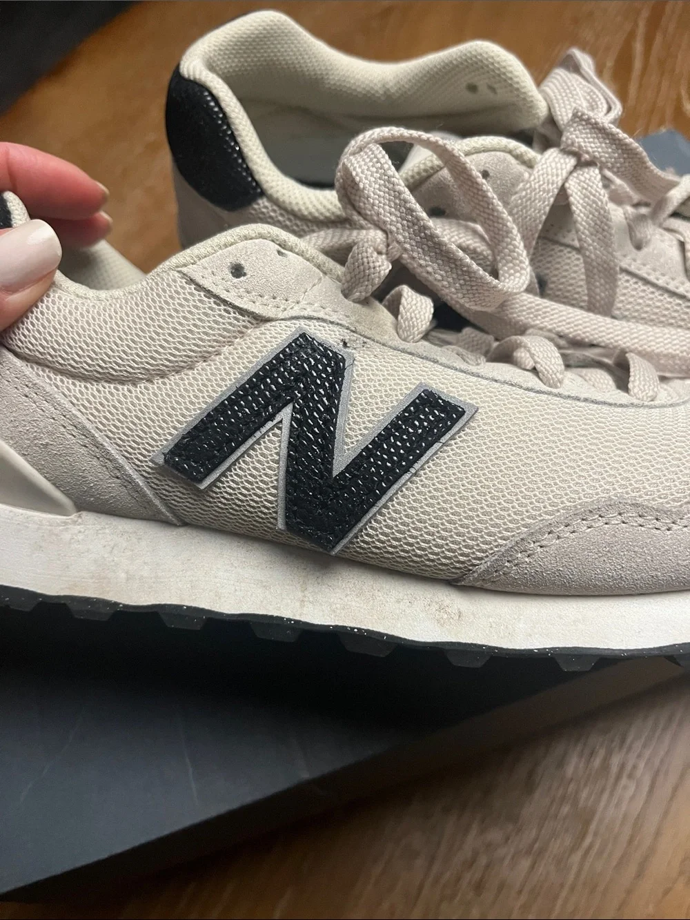 New Balance Woman’s  Cream Sneaker with dark navy blue 'N' Accent